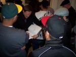 Craola sketching for fans.