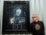 damien-hirst-poses-with-s-003