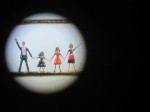 The Obama Family drawn on a pin head using a microscope to see.