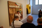 Viva La Revolucion Pedro Alonzo talks about osgemeos and their work. The wood piece behind was constructed using leftovers from Swoon's installation.