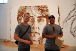 Viva La Revolucion Seth Carmichael and Dan Flores, Shepard Fairey's assistant, in front of Vhils' new piece.