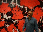 p1070357 Gary Baseman in front of Cleon Peterson painting