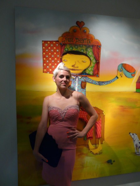 Rosson Crow in front of Os Gemeos painting